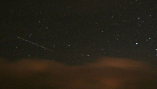a flash of light across the sky